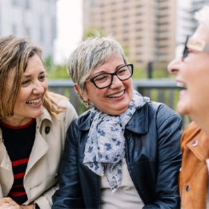 a group of friends smiling and laughing together