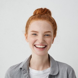 closeup of young woman smiling 