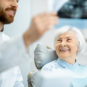 dentist talking to patient 